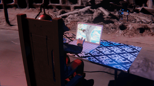 Desktop #2: The Hypebeast in the Electric Chair With a Drone and a Gardens Monitor on a Felt Zine Table in Conflict
